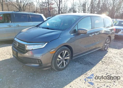 2023 Honda Odyssey Touring z USA, uszkodzony, nr VIN 5FNRL6H87PB032578